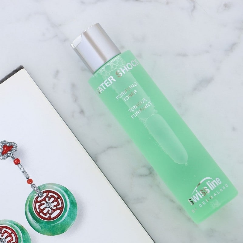 Dung dịch cân bằng độ Ph và se khít chân lông Swissline Water Shock Purifying Toner